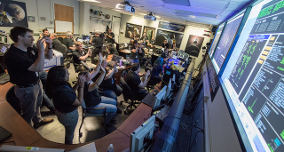 Illustration for article titled IT'S ALIVE!!! New Horizons Phones Home After Pluto Flyby